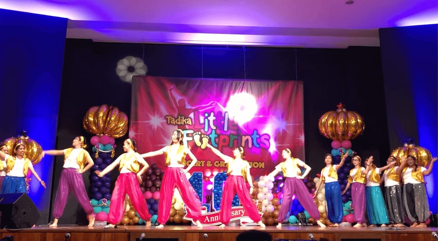 Teachers performing at the tenth anniversary show