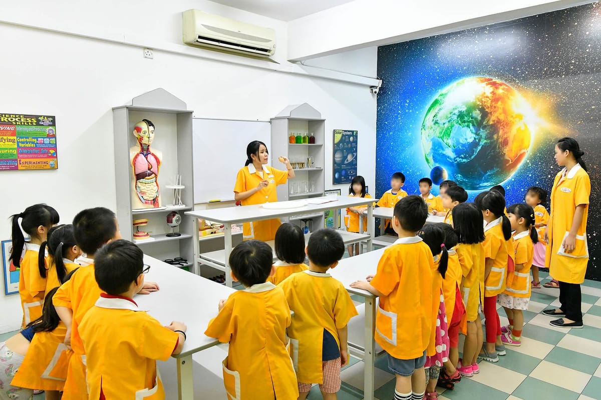 Teachers leading a science lesson